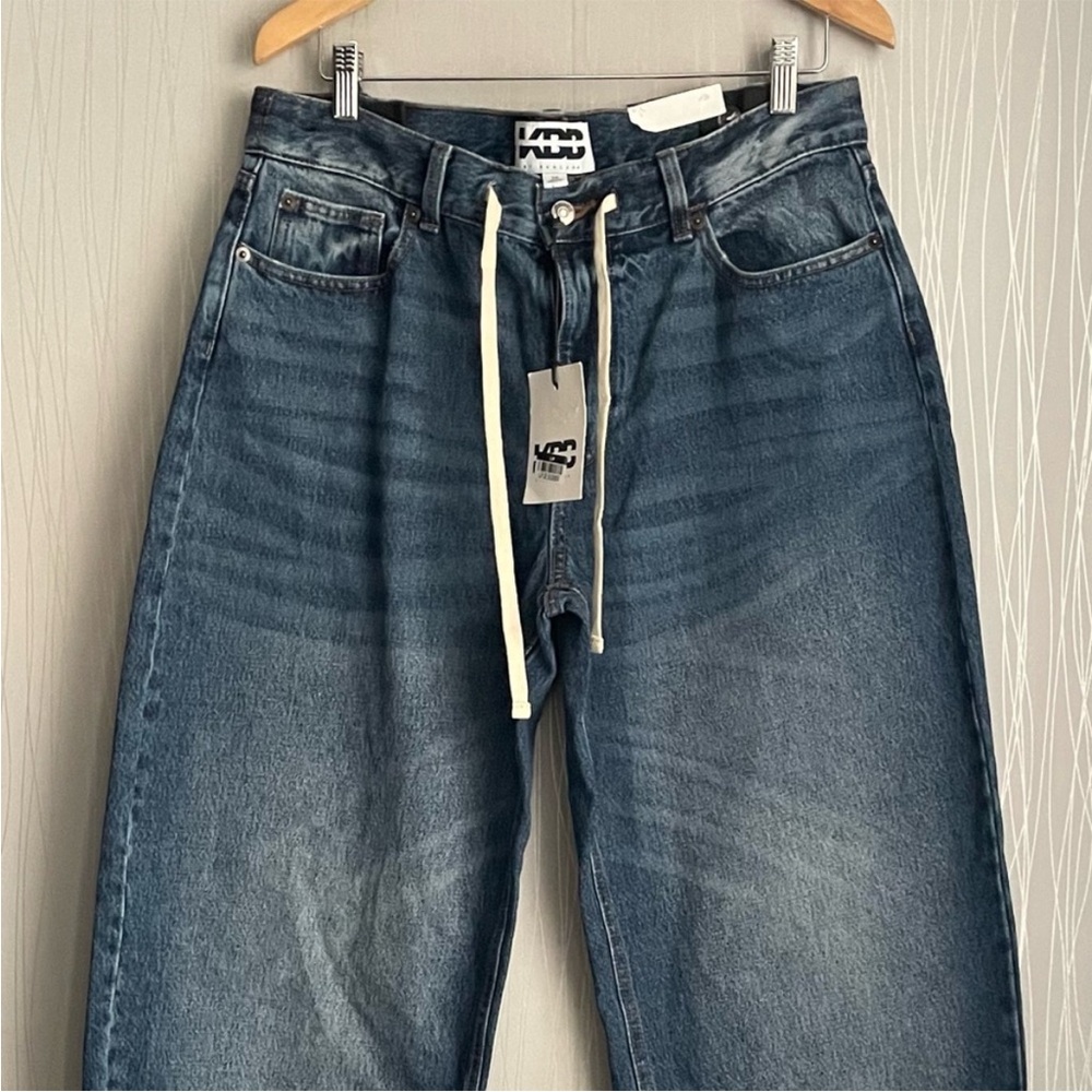 KBB by KAHLANA Women's Mid-Rise Barrel
Leg 'The Lynnox Jean' - Dark Wash 10 - Picture 3 of 10